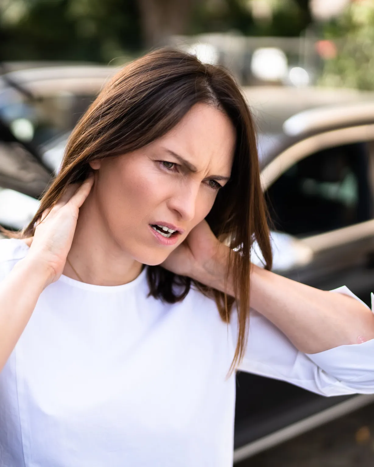 Patient recovering from whiplash with gentle chiropractic care in Lenexa, KS